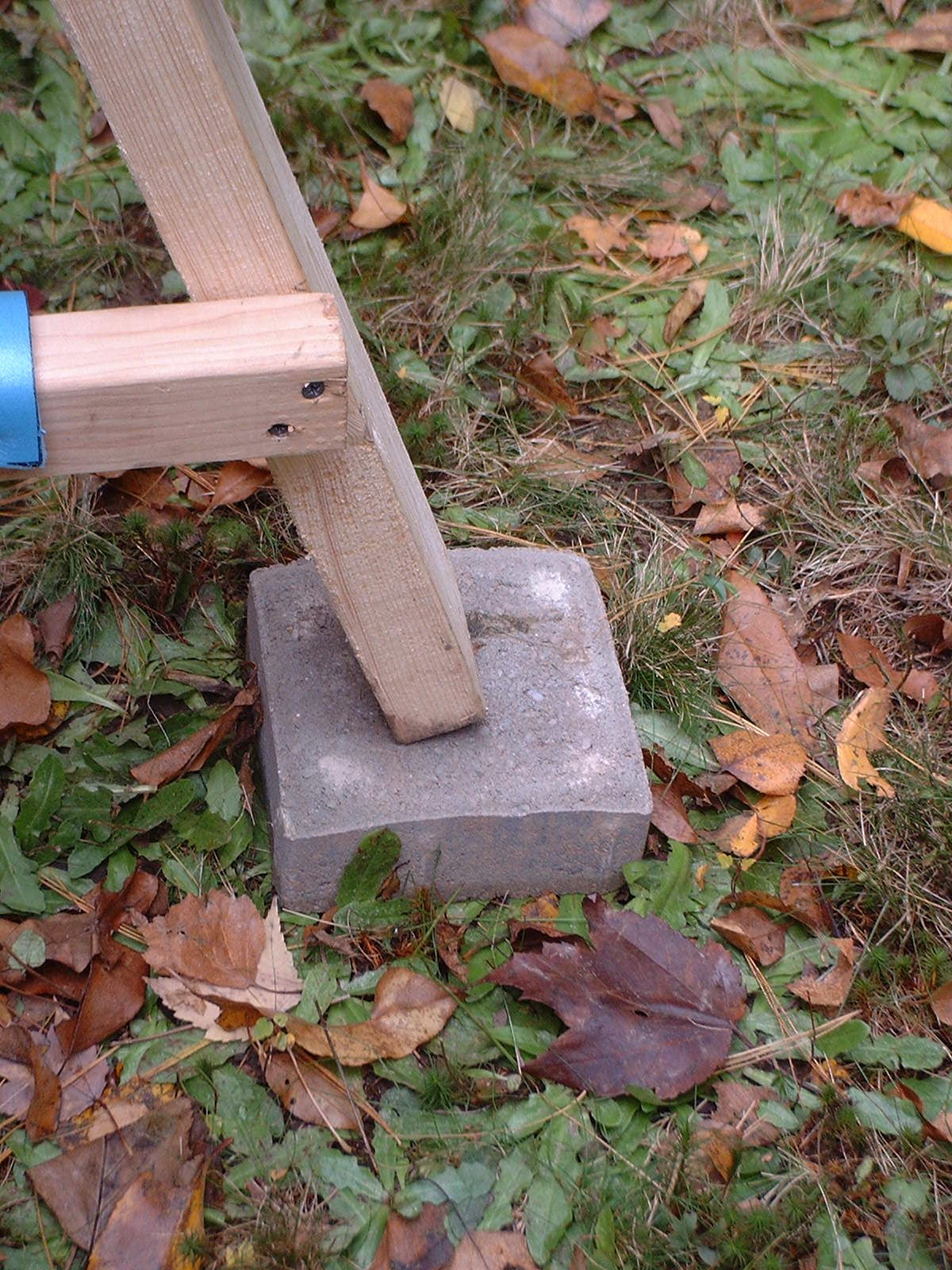 6" square cobble blocks used to support the A-frame kayak rack off the ground